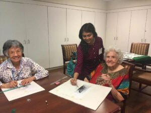 Houston artist Tasnuva Rahman gives back to the community by teaching an art class at Brookdale Retirement in Tomball, TX.